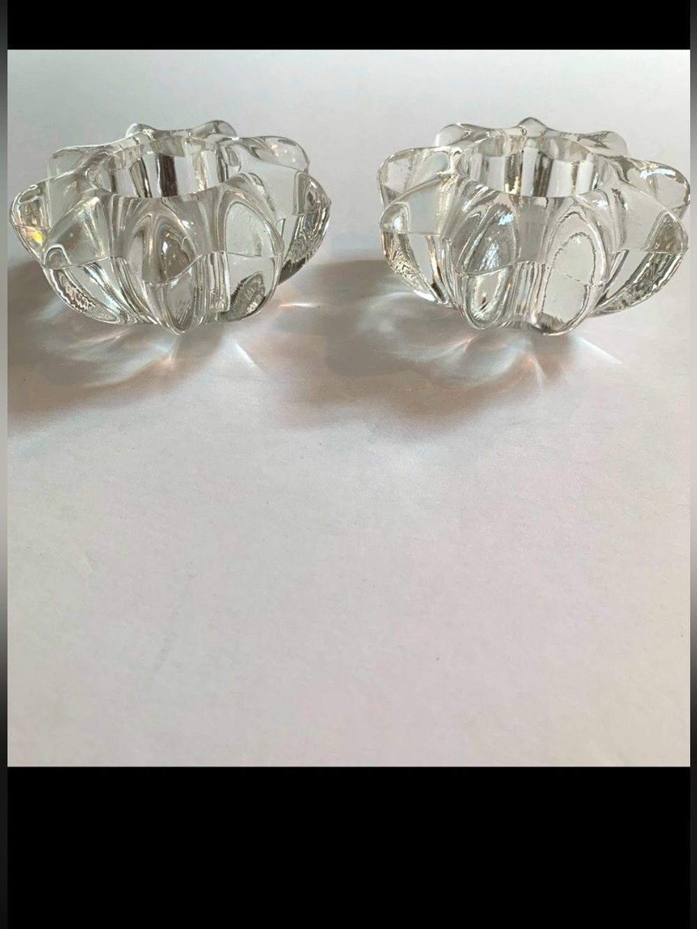 2 Heavy clear glass star flower candle holders 3 1/2” wide